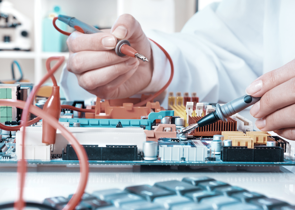 Close up technician working on circuit.