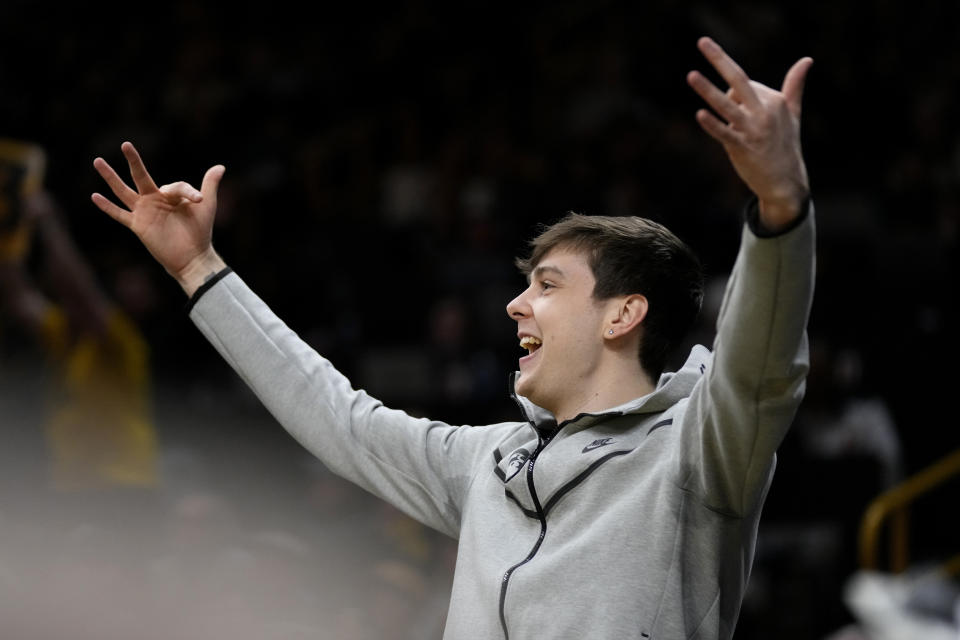 Iowa forward Patrick McCaffery reacts on the bench during the second half of an NCAA college basketball game against Indiana, Thursday, Jan. 5, 2023, in Iowa City, Iowa. (AP Photo/Charlie Neibergall)