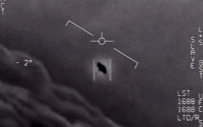 Video grab image shows part of an unclassified video taken by Navy pilots showing interactions with unidentified aerial phenomena - AFP