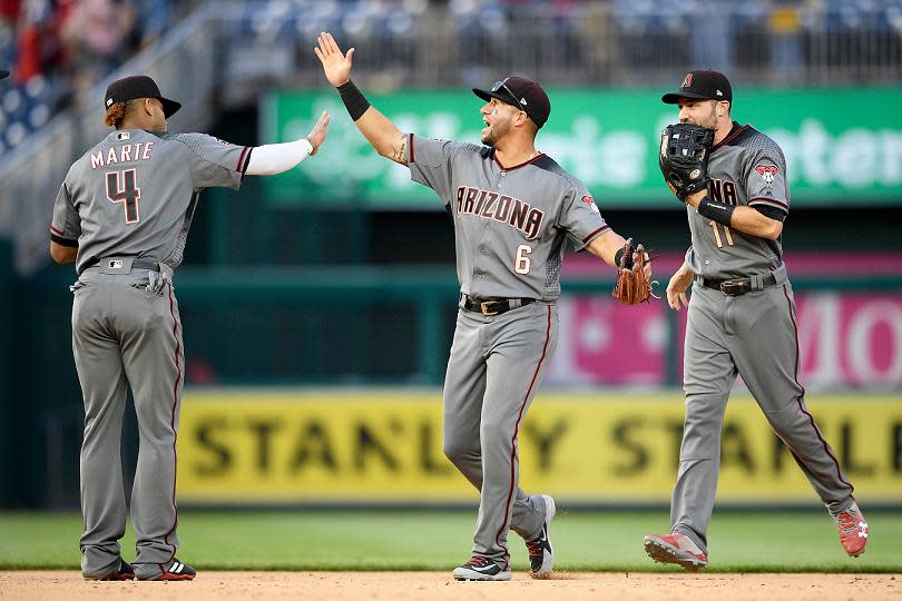 The Arizona Diamondbacks celebrated their ninth straight series win to open the season with Saturday’s victory in Washington. (AP)