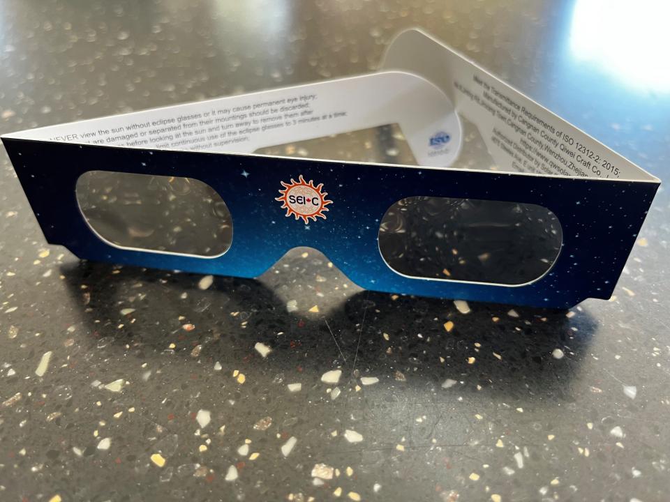 Solar glasses like these can be purchased online. Make sure they have the 