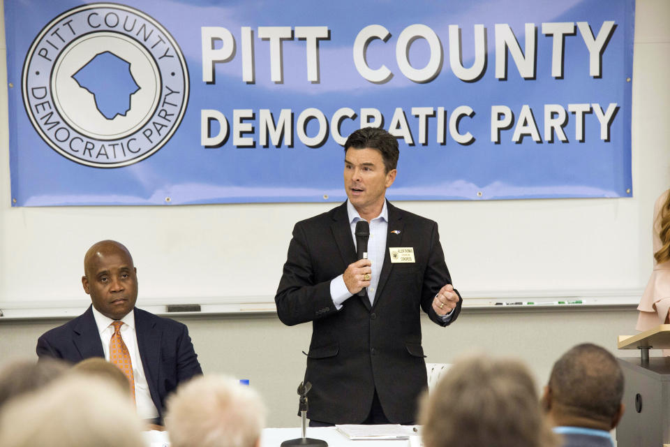 This photo taken April 15, 2019, shows Allen Thomas speaking during a forum held by the Pitt County Democratic Party for the Third Congressional District candidates in Winterville, N.C. U.S. Rep. Walter Jones Jr.'s long-held congressional seat in North Carolina was expected to be up for grabs soon, but it happened more quickly than most people anticipated. Months after the Republican announced his 2018 campaign would be his last, Jones' health faded. He died in February at age 76. Jones' death drew people from both sides of the aisle to praise his commitment to his constituents, his faith and his willingness to buck party leadership regardless of political consequences, such as when he opposed the Iraq War. It also drew more than two dozen candidates from four parties into an accelerated, off-year special election to replace him in the GOP-leaning 3rd Congressional District. (Juliette Cooke/The Daily Reflector via AP)