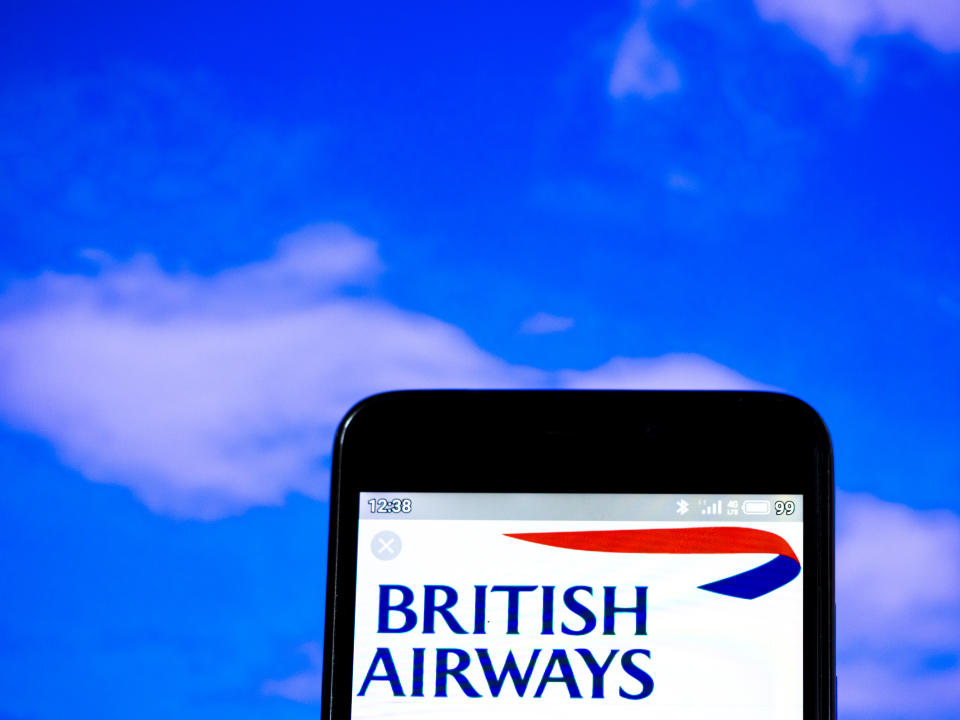 In this photo illustration the British Airways plc logo is seen displayed on a smartphone. Photo by Igor Golovniov/SOPA Images/LightRocket via Getty Images
