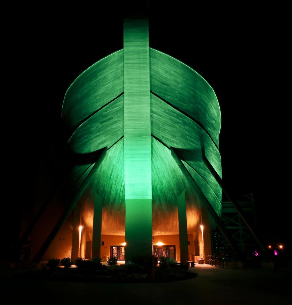 The replica of Noah's Ark at the Ark Encounter in Williamstown, Ky. is lighted green in honor of the victims of the coronavirus pandemic on April 11, 2020.  The governor asked Kentuckians to light their properties green for the victims.  The Ark Encounter remains temporarily closed due to the governor’s order for businesses and attractions to shut down during the pandemic.