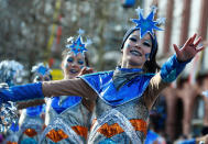 <p>Carnival revellers at the traditional “Rosenmontag” Rose Monday carnival parade in Mainz, Germany, Feb. 12, 2018. (Photo: Ralph Orlowski/Reuters) </p>