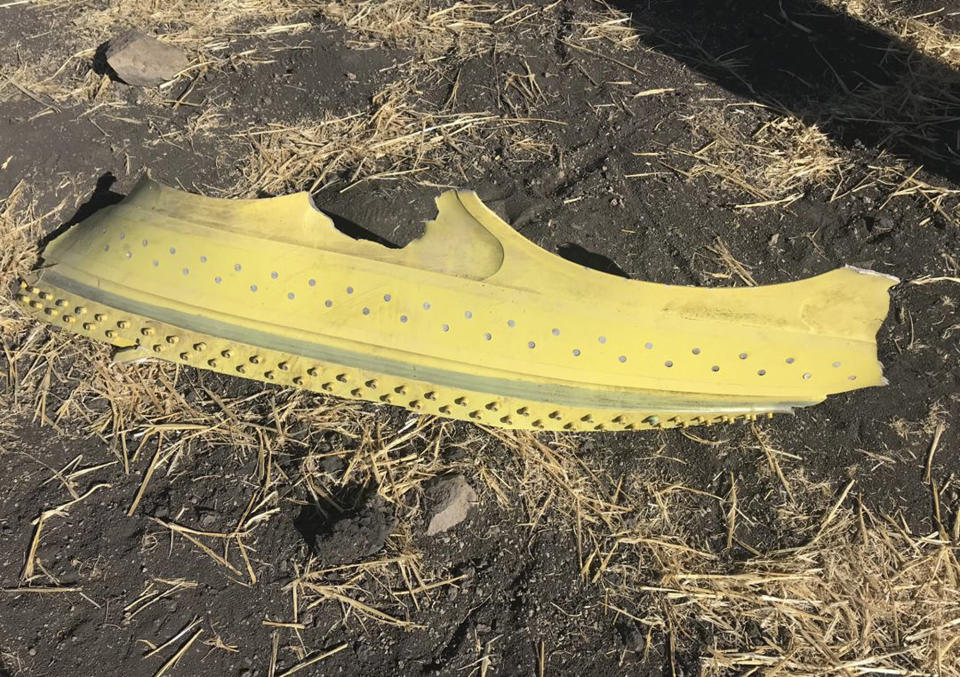 A piece of the wreckage of an Ethiopian Airlines flight that crashed shortly after takeoff lies at the scene at Hejere near Bishoftu, or Debre Zeit, some 50 kilometers (31 miles) south of Addis Ababa, in Ethiopia, March 10, 2019. (Photo: Yidnek Kirubel/AP)