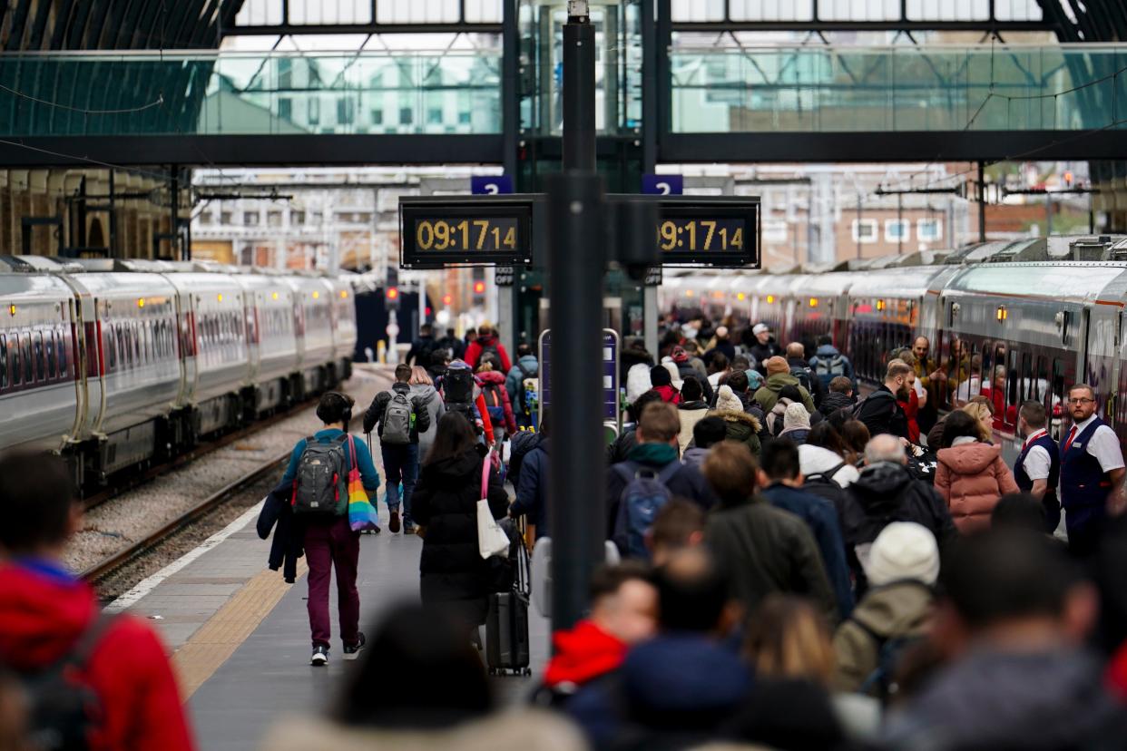 Passengers on the platform at London King's Cross Station as the getaway continues for the Easter weekend (Jordan Pettitt/PA Wire)