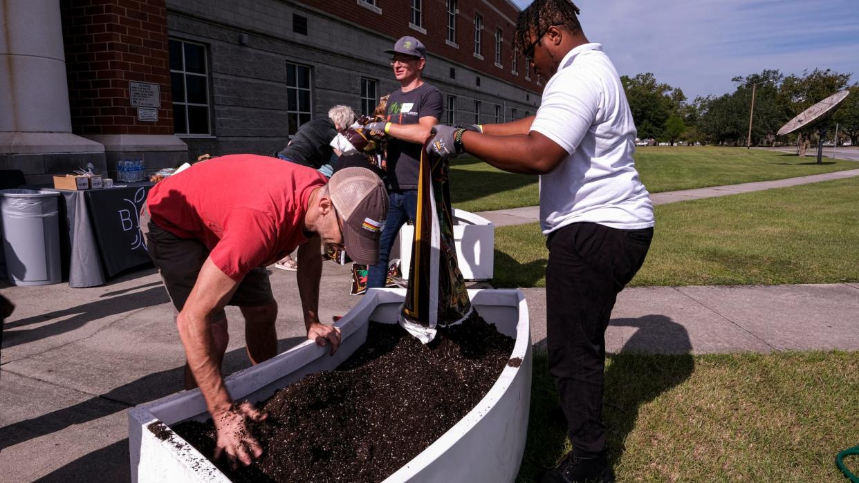 Savannah Educators and Student(s) lay soil in the garden beds at Savannah High School on Saturday, September 23rd, 2023.