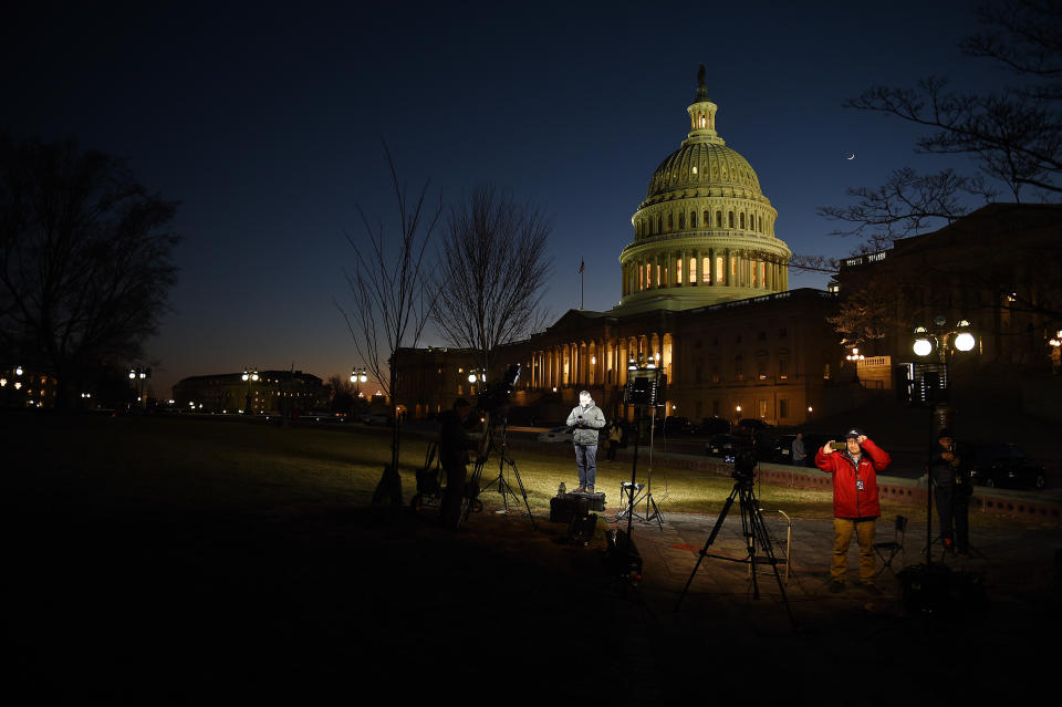 <p>TV crews set up their lights for a long night reporting on politics on Capitol Hill in Washington, Jan. 19, 2018, where lawmakers struggle to avoid an impending government shutdown. (Photo: Astrid Riecken for The Washington Post via Getty Images) </p>