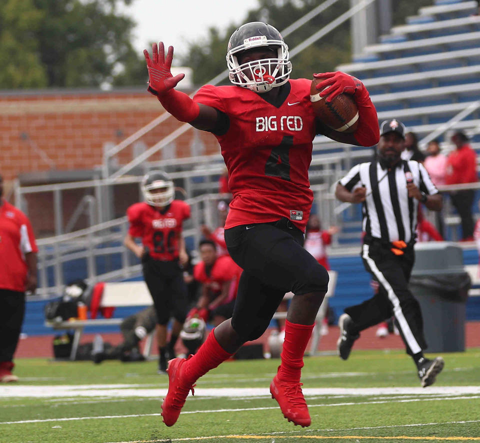 Trez DeVaughn scores a touchdown during their win over Woodward, Saturday, Oct. 2, 2021. He will play for the west team in the 2022 East-West All-Star Football Game June 3.