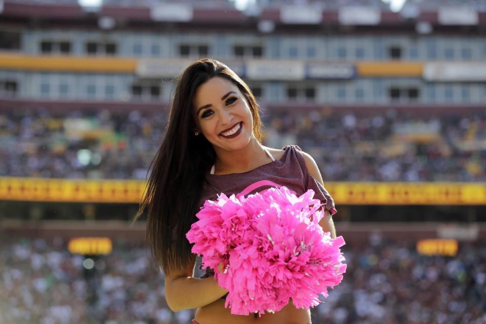 <p>A Washington Redskins cheerleader performs in the second half of an NFL football game between the Redskins and the Philadelphia Eagles, Sunday, Oct. 16, 2016, in Landover, Md. (AP Photo/Mark Tenally) </p>