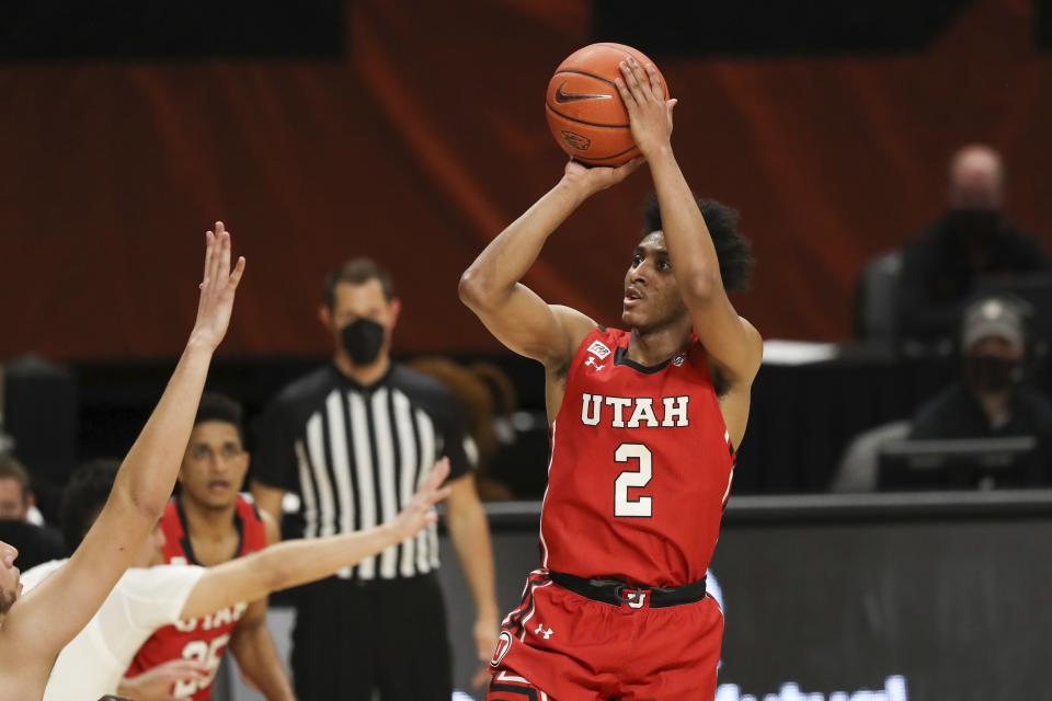 Utah’s Ian Martinez (2) shoots against Oregon State during game in Corvallis, Ore., Thursday, Feb. 18, 2021. The former Runnin’ Ute is now a member of the new-look Utah State Aggies. | Amanda Loman, Associated Press