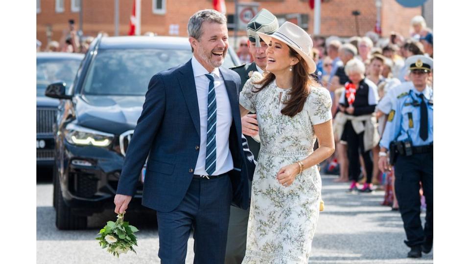 King Frederik and Queen Mary laugh in Grasten