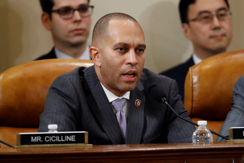 Rep. Hakeem Jeffries, D-N.Y., votes to approve the second article of impeachment against President Donald Trump during a House Judiciary Committee meeting on Capitol Hill, in Washington