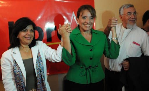 La candidata a la presidencia de Honduras por Libertad y Refundación, Xiomara Castro de Zelaya, durante un acto este martes en Tegucigalpa. Cuatro partidos políticos de Honduras, dos de derecha y dos de izquierda, inscribieron este martes a sus aspirantes a presidente, diputados y alcaldes de diferentes corrientes internas para las elecciones primarias del 18 de noviembre, informó el Tribunal Supremo Electoral (TSE). (AFP | orlando sierra)