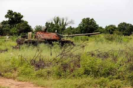 An abandoned tank is seen in a field in Bama, Borno State, Nigeria, August 31, 2016. REUTERS/Afolabi Sotunde