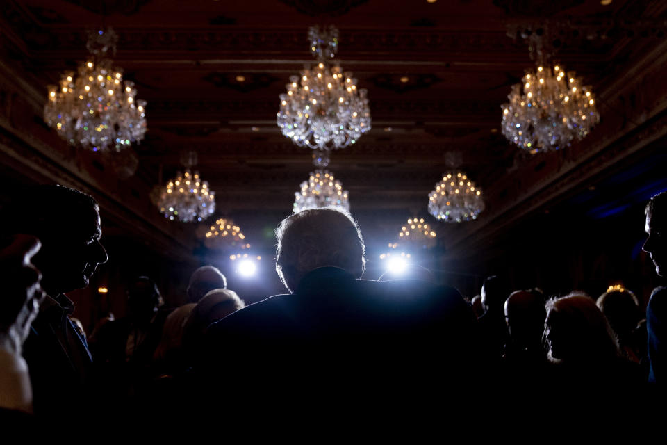 Former President Donald Trump greets guests at Mar-a-lago on Election Day, Tuesday, Nov. 8, 2022, in Palm Beach, Fla. (AP Photo/Andrew Harnik)