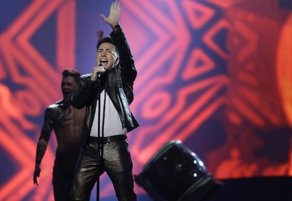 Ryan Dolan of Ireland performs his song "Only Your Love Survives" during a rehearsal for the final of the Eurovision Song Contest at the Malmo Arena in Malmo, Sweden, Friday, May 17, 2013. The contest is run by European television broadcasters with the event being held in Sweden as they won the competition in 2012, the final will be held in Malmo on May 18. (AP Photo/Alastair Grant)