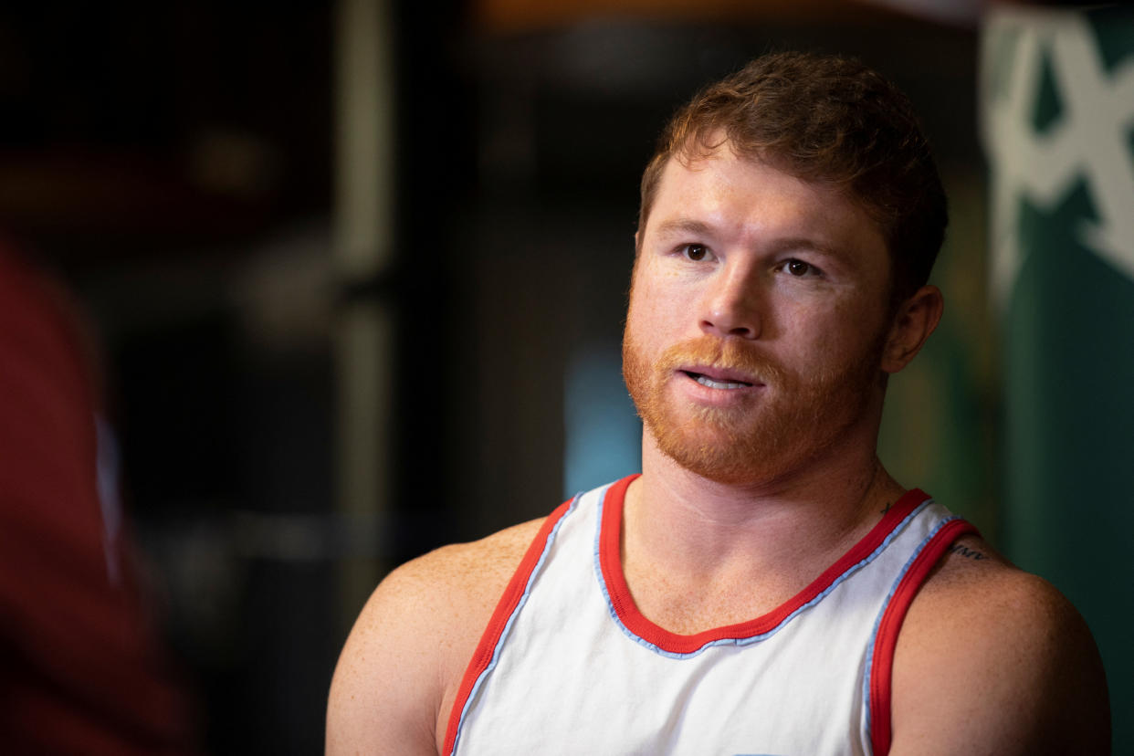 Mexican boxer Canelo Alvarez apologized after threatening Argentina soccer player Lionel Messi over a misunderstanding in a video. (REUTERS/Kristian Carreon)