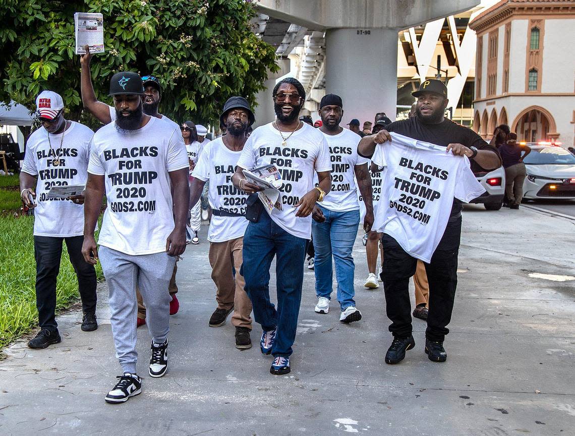 Members of the Blacks for Trump supporters group lead by Maurice Symonette (center) marched in front of the Miami Federal Courthouse ahead of former President Donald Trump’s court appearance, on Tuesday, June 13, 2023.