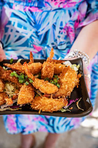 <p>ROBBIE CAPONETTO</p> Tasting and Toasting. Donâ€™t miss the chance to try a plate of coconut shrimp from Kane Tiki Bar & Grill at JW Marriott Marco Island Beach Resort or the tiramisu martini from Sale e Pepe restaurant.