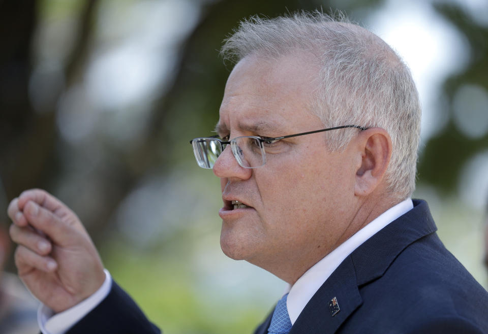 Australia's Prime Minister Scott Morrison speaks to the media in Sydney, Monday, March 1, 2021. Morrison stood by an unnamed Cabinet minister against calls for him to step down from office over an allegation that he raped a 16-year-old girl more than 30 years ago. (AP Photo/Rick Rycroft)