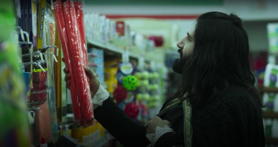 Nandor at a supermarket, picking up crepe paper, in "What We Do in the Shadows"