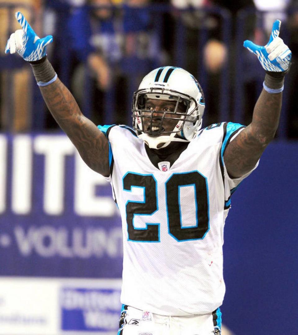 Carolina Panthers cornerback Chris Gamble celebrates his interception of a pass by Indianapolis Colts quarterback Curtis Painter (7) during fourth quarter action Sunday, November 27, 2011 at Lucas Oil Stadium in Indianapolis, IN. The Panthers defeated the Colts 27-19. Jeff Siner - jsiner@charlotteobserver.com