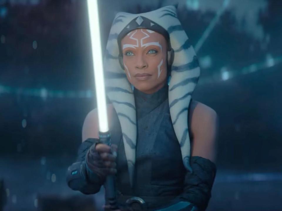 Rosario Dawson as Ahsoka Tano holding a lightsaber in "Ahsoka."