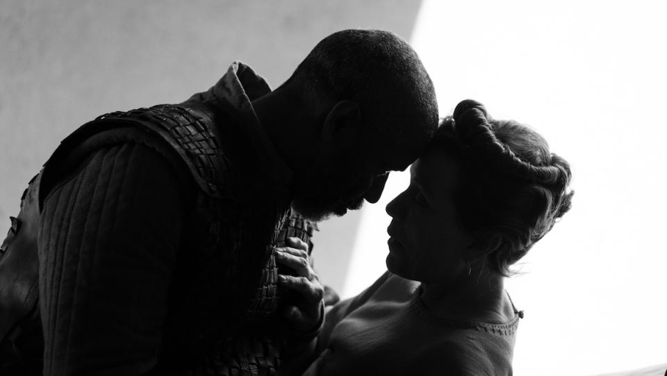 Denzel Washington and Frances McDormand are shrouded in darkness in The Tragedy of Macbeth