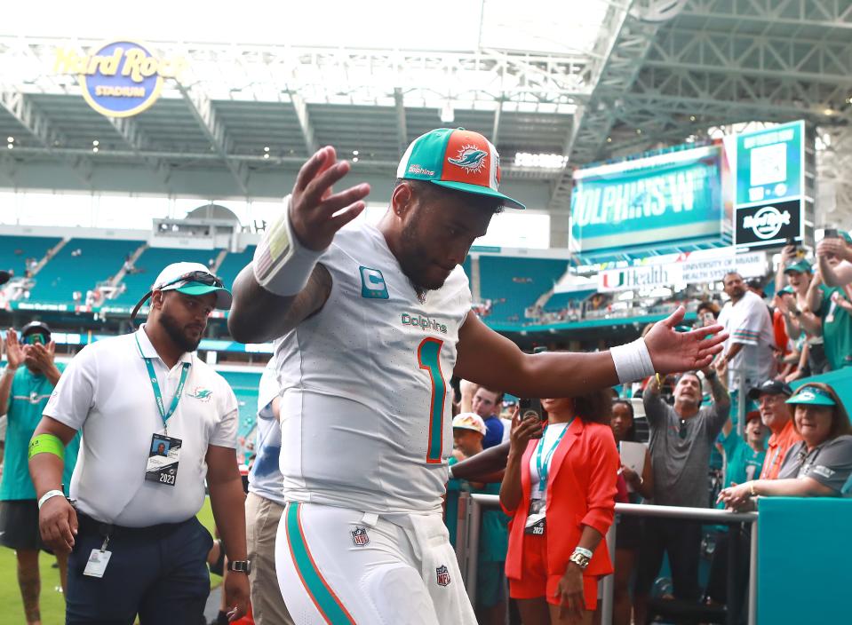 Tua Tagovailoa #1 of the Miami Dolphins reacts after his team's 70-20 win against the Denver Broncos at Hard Rock Stadium on September 24, 2023 in Miami Gardens, Florida.