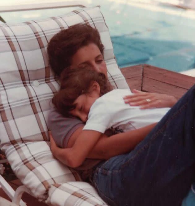 The author, age 10, with her mother in their backyard. 