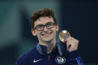 Stephen Nedoroscik, of the United States, celebrates after winning the bronze medal during the men's artistic gymnastics individual pommel finals at Bercy Arena at the 2024 Summer Olympics, Saturday, Aug. 3, 2024, in Paris, France. (AP Photo/Charlie Riedel)