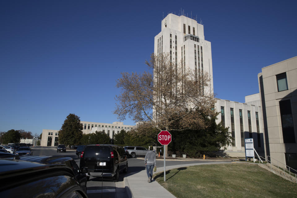 The motorcade of President Donald Trump waits at Walter Reed National Military Medical Center, Saturday, Nov. 16, 2019, in Bethesda, Md. (AP Photo/Manuel Balce Ceneta)