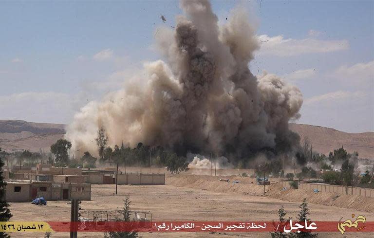 An image made available by Jihadist media outlet Welayat Homs on May 30, 2015, allegedly shows the Tadmur prison in the Syrian city of Palmyra being blown up by the Islamic State group