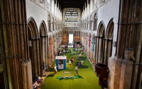 Rochester Cathedral attracted criticism for opening a minigolf course in its nave - Credit: AFP