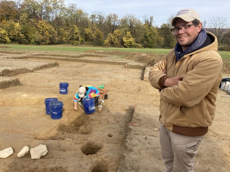 Archeologist John Crawmer led the team that found evidence of the precise location of Camp Security in Springettsbury Township. Excavating one of the post holes that formed the perimeter of the stockade is his assistant Samantha Muscella.