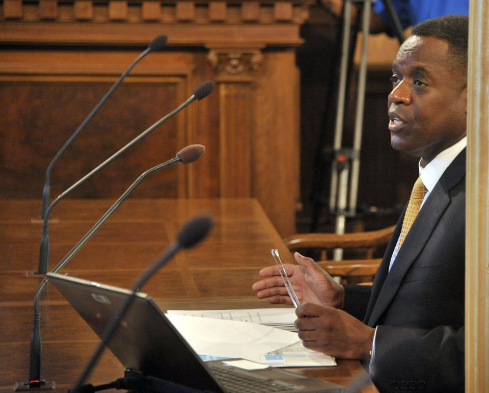 Detroit's emergency manager Kevyn Orr testifies before the House committee on Detroit's bankruptcy, at the State Capitol in Lansing, Mich., Tuesday, May 13, 2014. (AP Photo/The Detroit News, Dale G. Young) DETROIT FREE PRESS OUT; HUFFINGTON POST OUT.