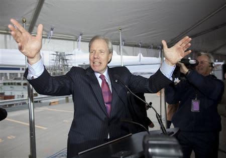 James Irving, owner of timber and shipbuilding conglomerate J.D. Irving Limited, congratulates workers after winning a $25 billion federal shipbuilding contract at the Irving Shipyards in Halifax, Nova Scotia, in this October 19, 2011 file photo. REUTERS/Sandor Fizli/Files