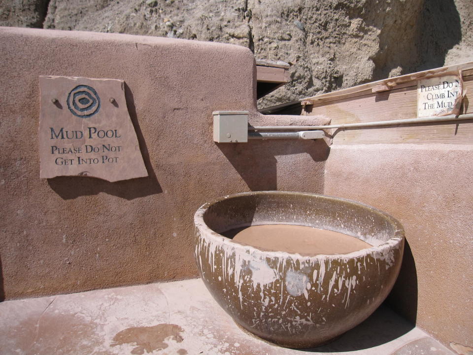 This October 2012 photo of a mud bath at Ojo Caliente, a natural hot springs attraction in New Mexico. The site includes a hotel and restaurant in addition to mineral springs, and a variety of pools. (AP Photo/Beth Harpaz)