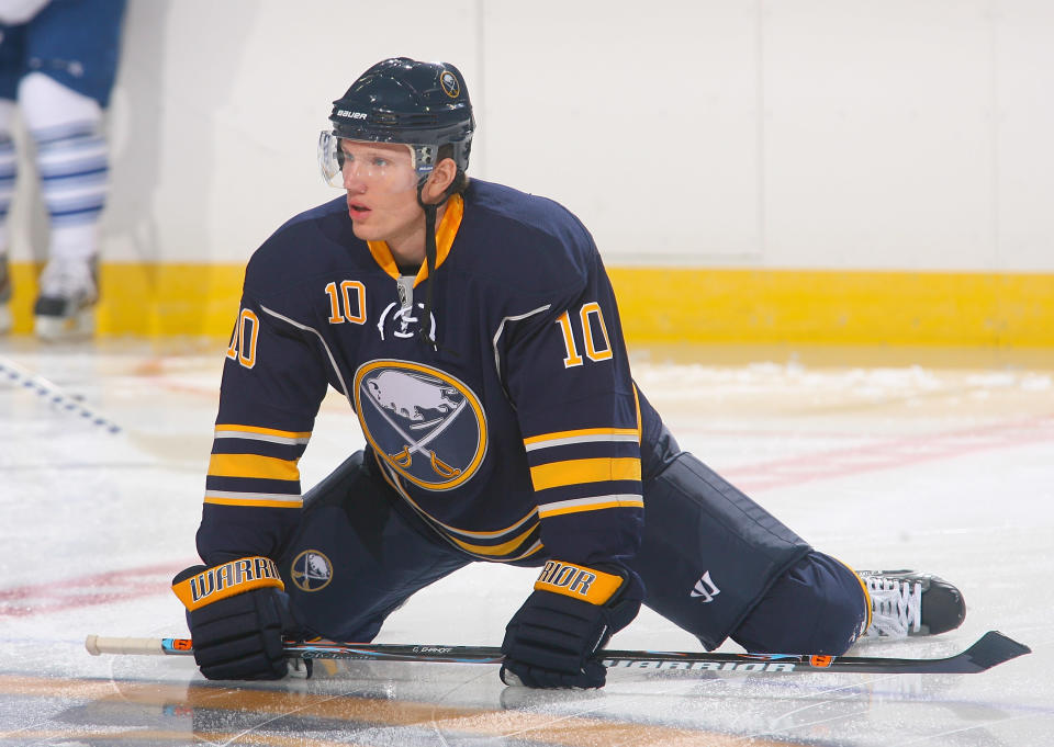 BUFFALO, NY - SEPTEMBER 24: Christian Ehrhoff #10 of the Buffalo Sabres streches during warm-ups prior to play against the Toronto Maple Leafs at First Niagara Center on September 24, 2011 in Buffalo, New York. (Photo by Rick Stewart/Getty Images)