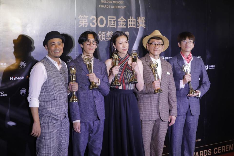 Taiwan aboriginal singer Yawai Mawlin and her group pose with their trophies after winning the Best Aboriginal Album at the 30th Golden Melody Awards in the Taipei on June 29, 2019. (Photo by Daniel Shih / AFP)        (Photo credit should read DANIEL SHIH/AFP/Getty Images)