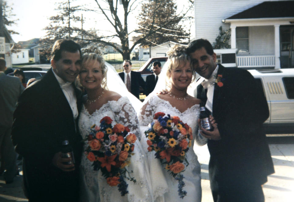 Craig and Diane (L) with Darlene and Mark (R) on their joint wedding day. (Photo: Getty Images)