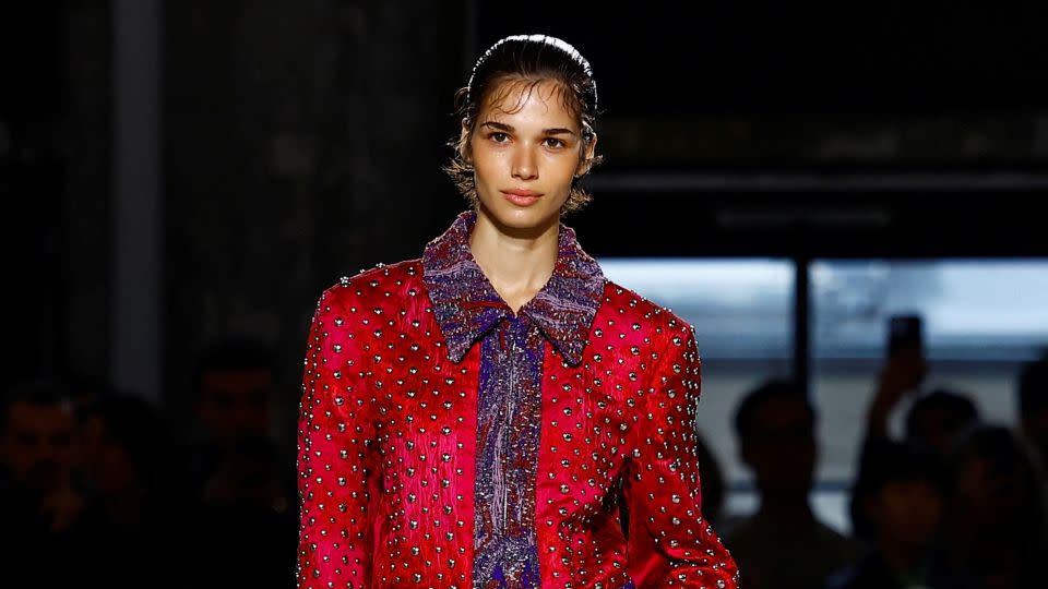 Currently sans designer, Dries Van Noten still created a quintessential collection featuring lingerie pieces, slip-on dresses and Bermuda shorts which were reinterpreted with embroidery, snake prints, stripes and pops of bright color. - Sarah Meyssonnier/Reuters