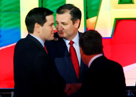 Republican U.S. presidential candidates Marco Rubio, Ted Cruz and John Kasich (L-R) talk at the end of the Republican U.S. presidential candidates debate sponsored by CNN for the 2016 Republican U.S. presidential candidates in Houston, Texas, February 25, 2016. REUTERS/Mike Stone