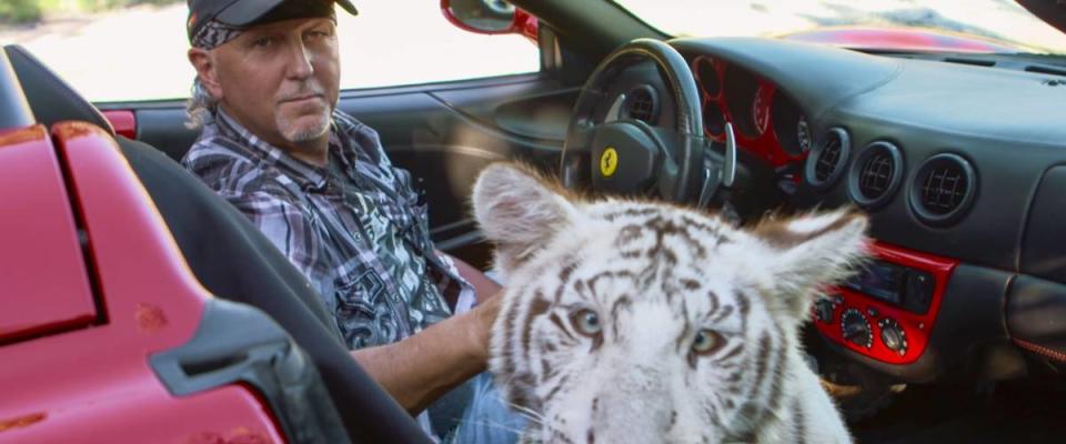 Jeff Lowe with a white tiger
