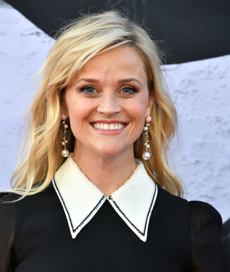 Reese Witherspoon is twinning with her sons in this snap, and we can’t believe this is real