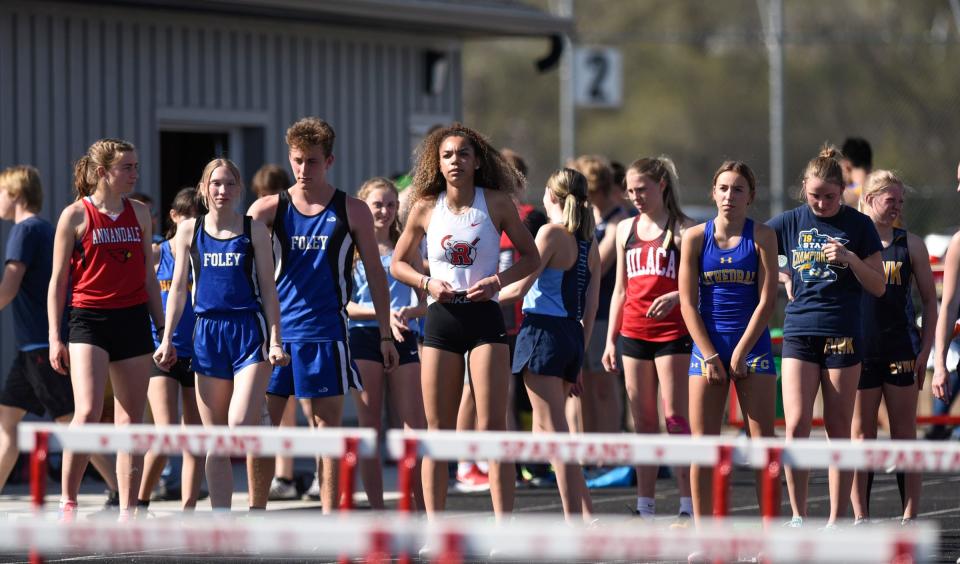 ROCORI junior Cecelia Woods prepares to start the 100m hurdles Tuesday, May 10, 2022, at the Section 5-2A true team meet in Cold Spring.