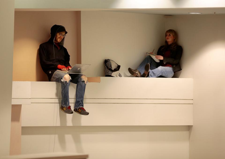 "Ethan & Violet" sit above a staircase in the College of Design, Architecture, Art and Planning building on the campus of the University of Cincinnati. Marrero's installation, first displayed in 2005, originally only featured "Ethan" as a tribute to the college's students. In 2016, the artist was asked to return and update the installation by adding "Violet."