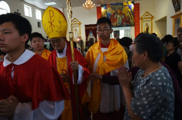 Bishop Melchior Shi Hongzhen leads a procession through the "underground" Zhongxin Bridge Catholic Church during a service celebrating the Feast of the Ascension in Tianjin, on May 24, 2015